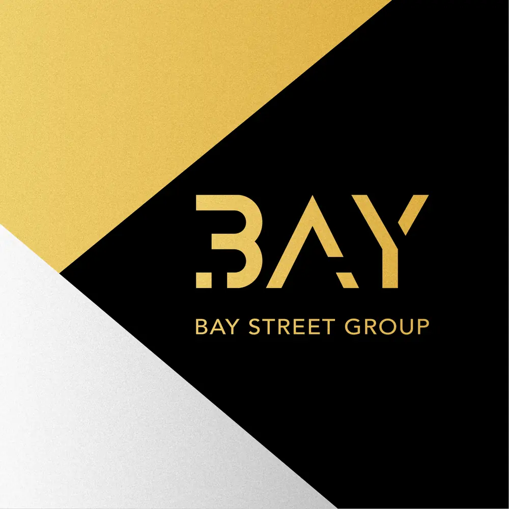 品牌手册封面：金、黑、银三块斜切色面上的 BAY 标志
