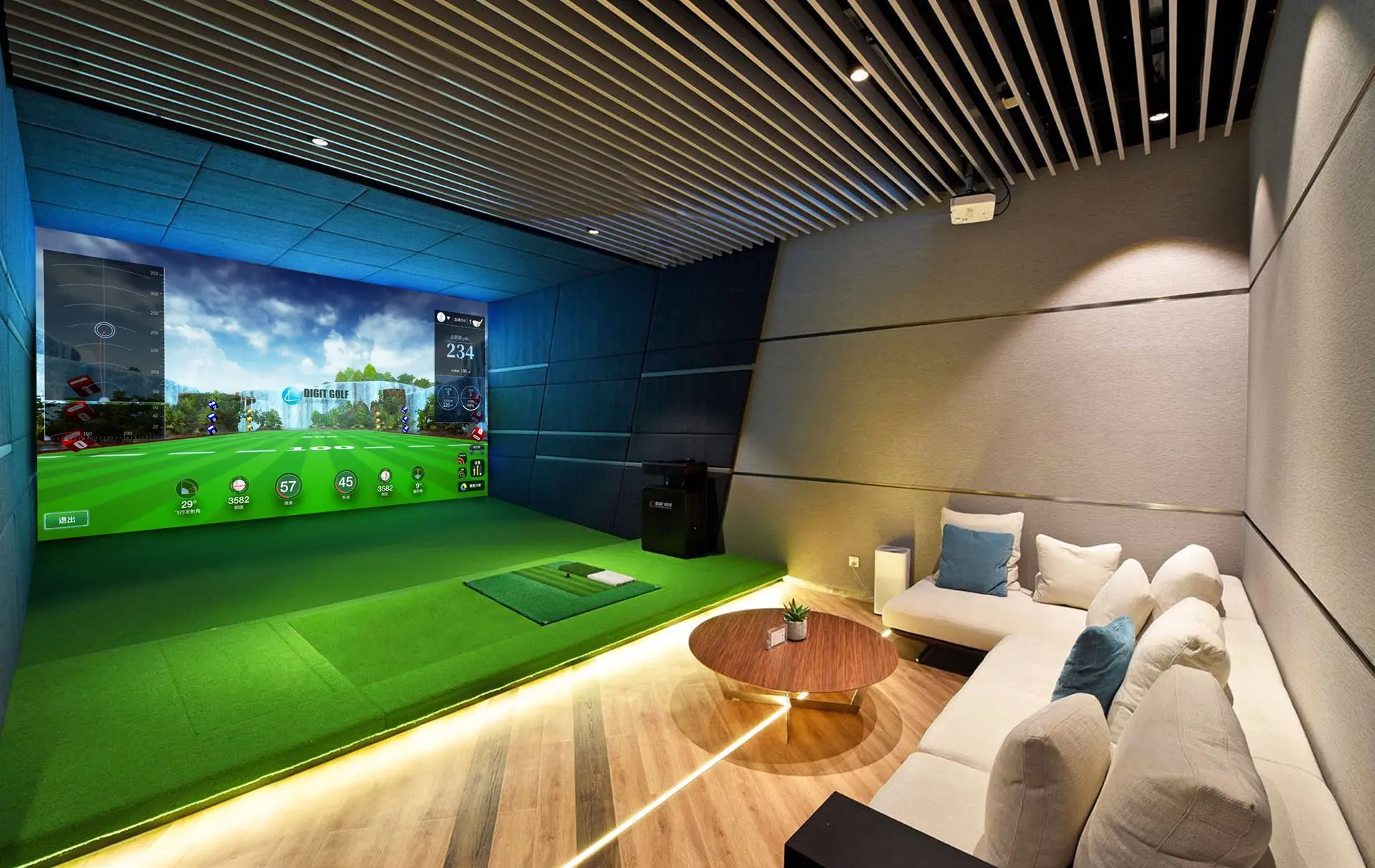 An indoor golf simulator room: a full-wall screen, a green hitting area and a lounge (Digit Golf promotional photograph)