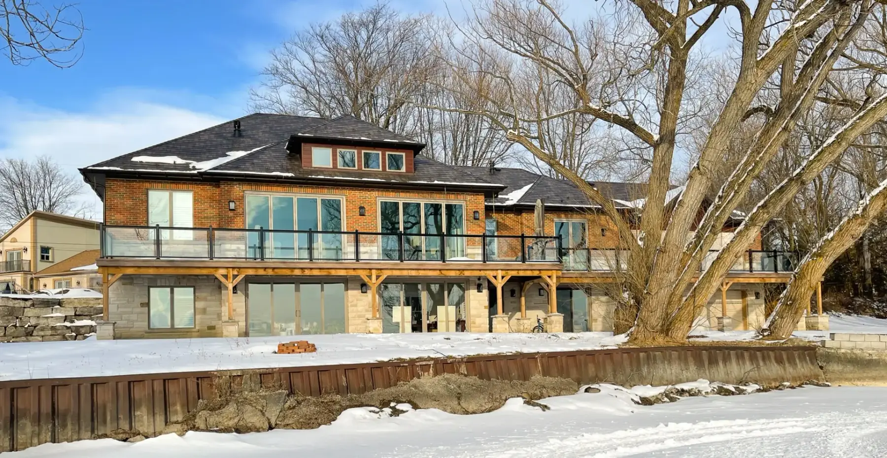 The Keswick lakefront home in winter, seen from the lake