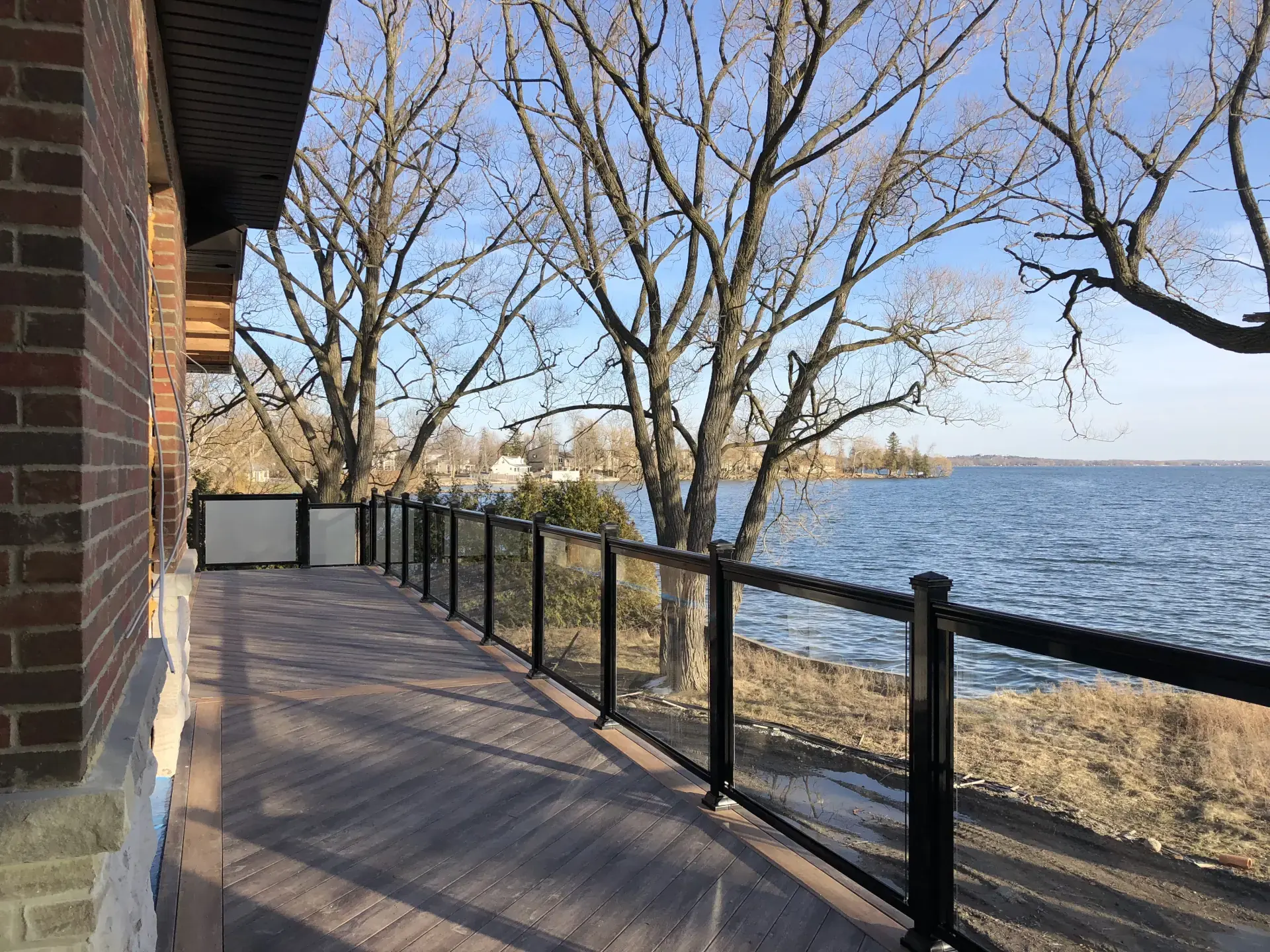 Terrace and lake at the Keswick lakefront home