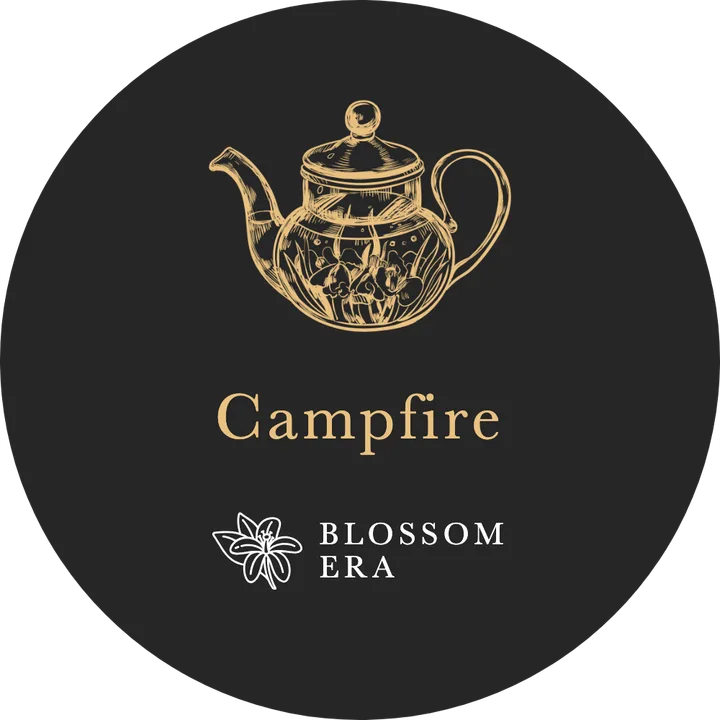 The Campfire lid: a gold drawing and the name on charcoal
