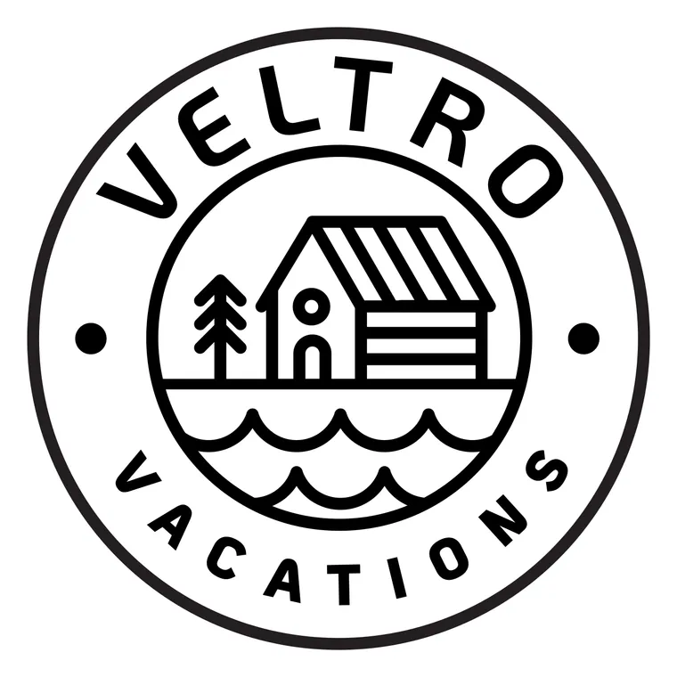 Badge variation: a lighter VELTRO, side dots, two rows of waves
