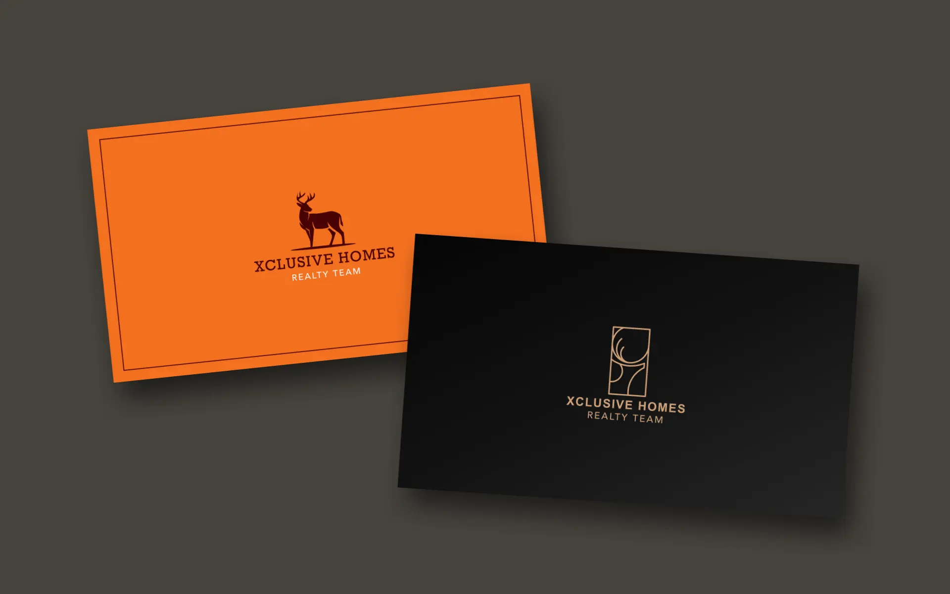 Two card fronts: a standing stag on signal orange, and a copper framed stag on black